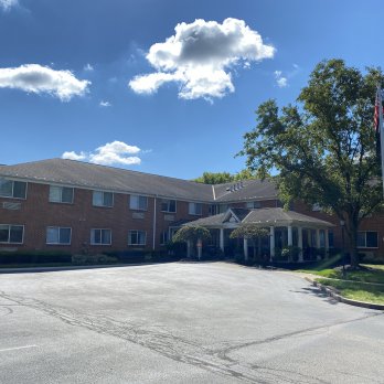 parking lot view of Earl J. Maag